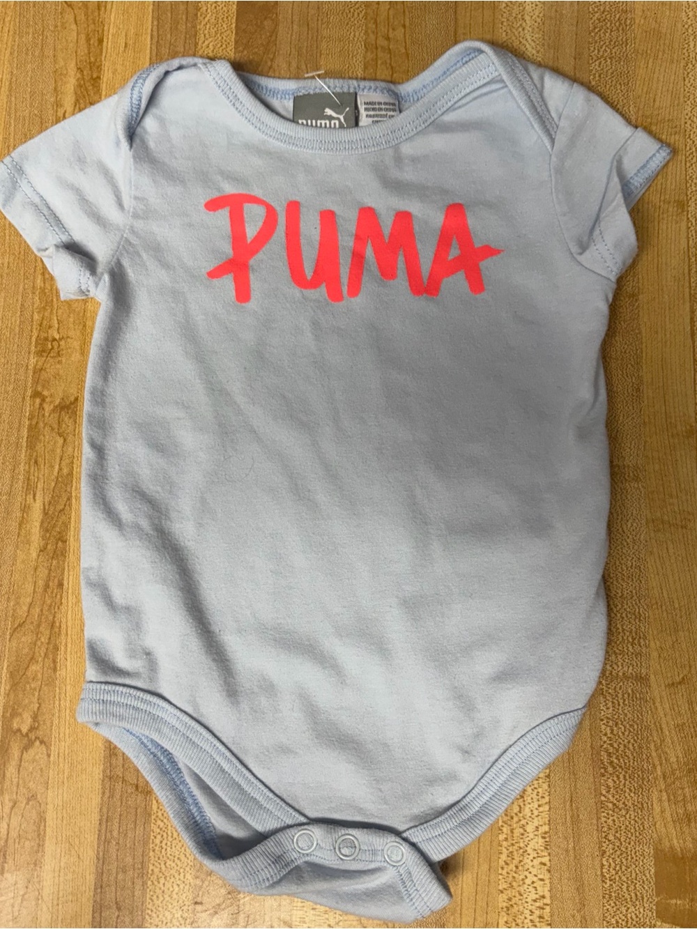 Puma Light Blue Baby Bodysuit with Neon Pink Logo